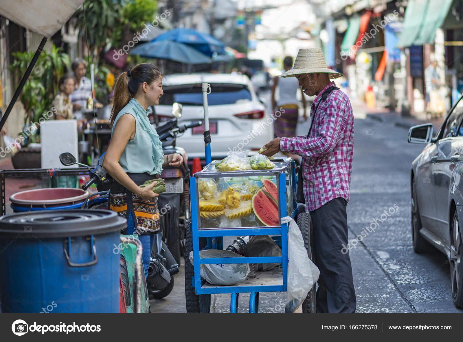 Bankok, Thailand – Sep 9, 2017 Street vendor of fruits in Yaowarat or Chinatown