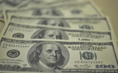 Dólar comercial cai após aprovação da nova meta fiscal, durante a madrugada