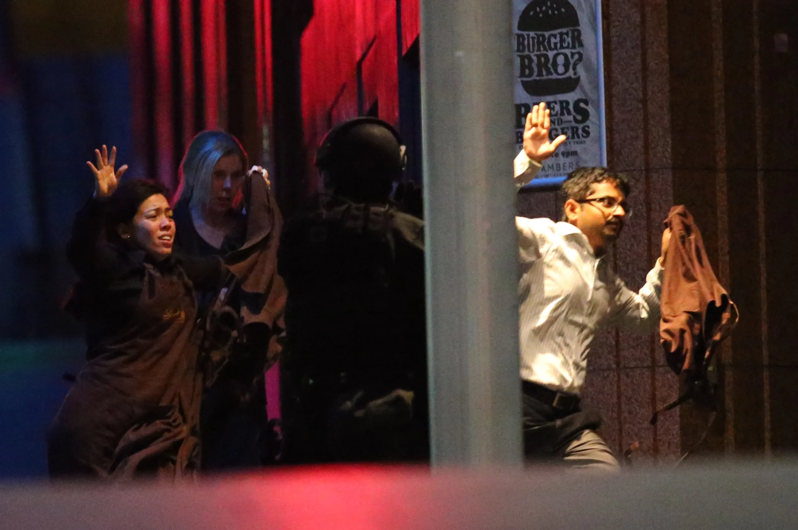 Hostages run towards armed tactical response police as they run to freedom from a cafe under siege at Martin Place in the central business district of Sydney, Australia, Tuesday, Dec. 16, 2014. New South Wales state police would not say what was happening inside the cafe or whether hostages were being held. But television footage […]