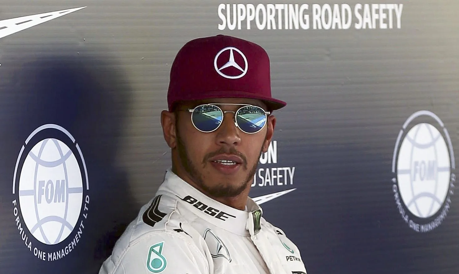 epa05305783 British Formula One driver Lewis Hamilton of Mercedes AMG GP reacts after taking the pole position following the qualifying session at the Barcelona-Catalunya circuit in Montmelo, Barcelona, Spain, 14 May 2016. The Spanish Formula One Grand Prix will take place on 15 May 2016. EPA/TONI ALBIR