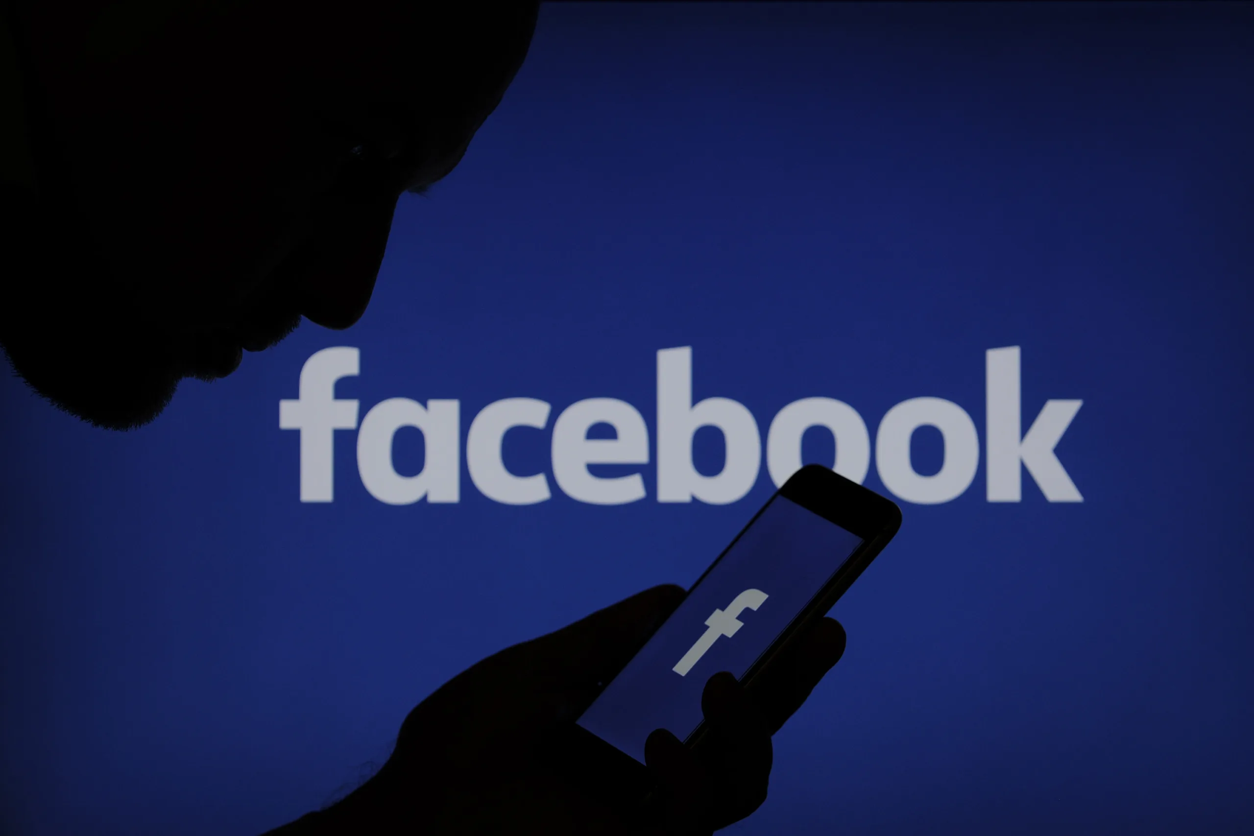 A Facebook logo is seen on a smartphone in this photo illustration on November 15, 2017. (Photo by Jaap Arriens/NurPhoto via Getty Images)