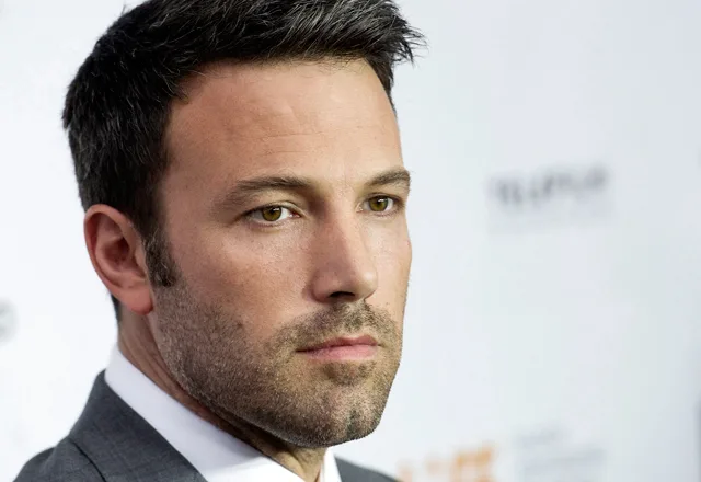 Actor and director Ben Affleck poses for a photograph on the red carpet at the gala for the new movie “Argo” during the 37th annual Toronto International Film Festival in Toronto on Friday, Sept. 7, 2012. (AP Photo/The Canadian Press, Nathan Denette)