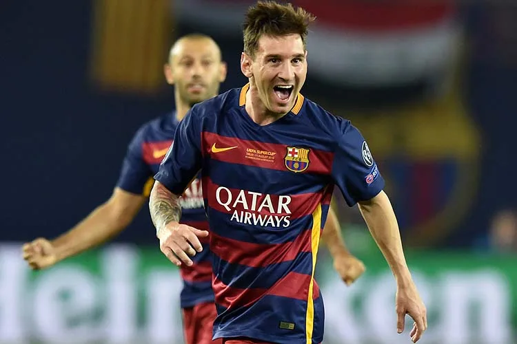 Barcelona’s Argentinian forward Lionel Messi celebrates after scoring a goal during the UEFA Super Cup final football match between FC Barcelona and Sevilla FC in Tbilisi on August 11, 2015. AFP PHOTO/KIRILL KUDRYAVTSEV