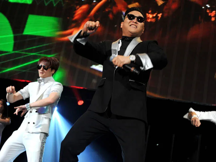 WASHINGTON, DC – DECEMBER 11: Singer PSY performs onstage during Hot 99.5’s Jingle Ball 2012, presented by Charleston Alexander Diamond Importers, at The Patriot Center on December 11, 2012 in Washington, D.C. (Photo by Theo Wargo/Getty Images for Jingle Ball 2012)