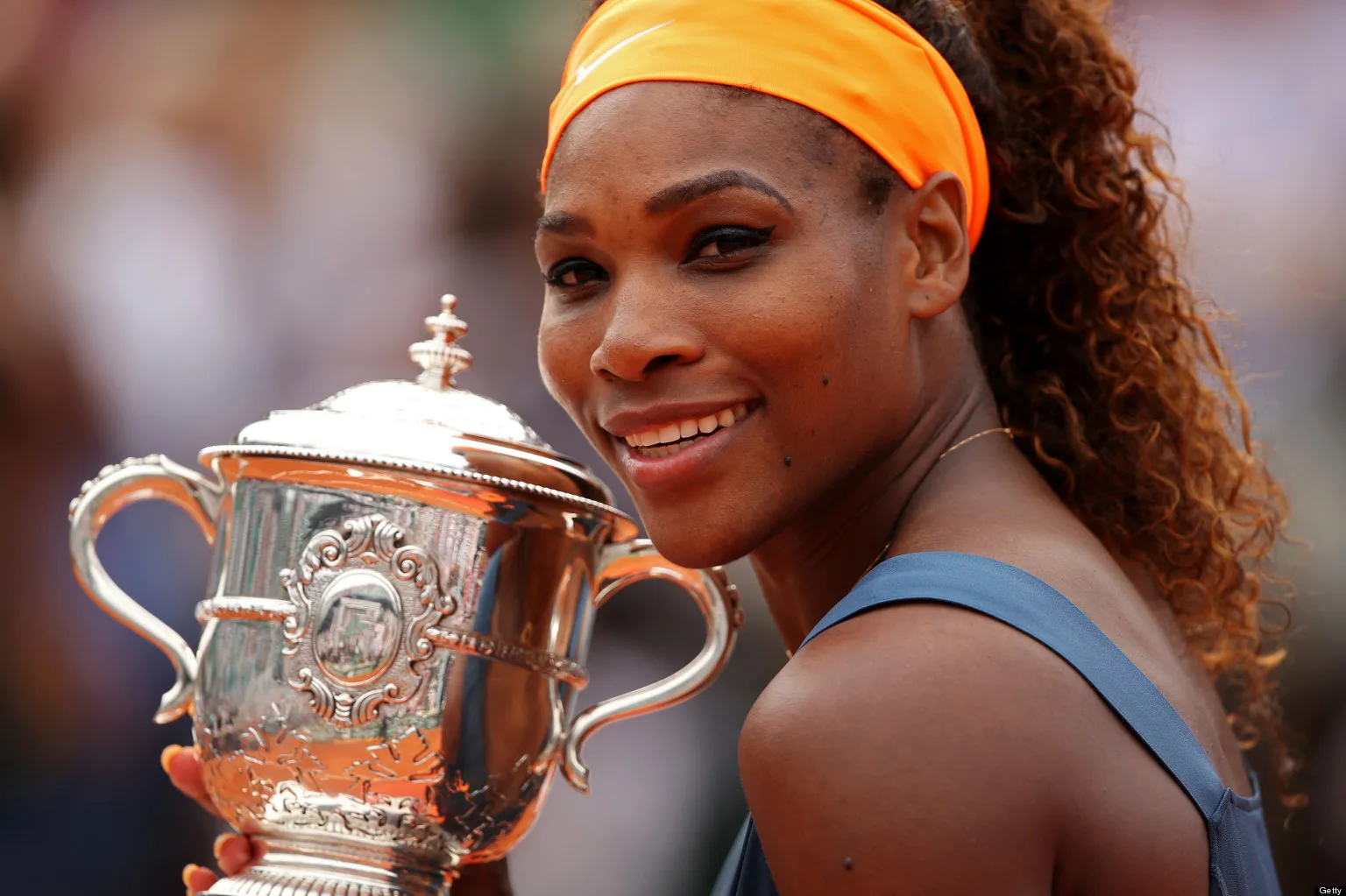 PARIS, FRANCE – JUNE 08: Serena Williams of United States of America poses with the Coupe Suzanne Lenglen after victory in the Women’s Singles Final match against Maria Sharapova of Russia during day fourteen of French Open at Roland Garros on June 8, 2013 in Paris, France. (Photo by Clive Brunskill/Getty Images)