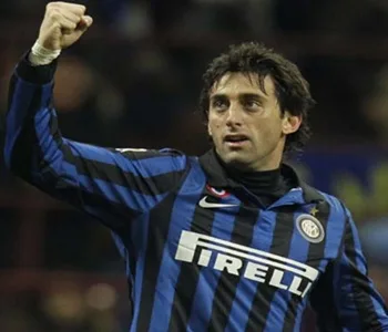 Inter Milan Argentine forward Diego Milito celebrates after scoring during a Serie A soccer match between Inter Milan and Parma, at the San Siro stadium in Milan, Italy, Saturday, Jan. 7, 2012. (AP Photo/Luca Bruno)