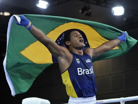 SINGAPORE, 25 Aug. 2010 – David Lourenco of Brazil celebrates his victory after the Welter 69kg boxing final match in Singapore Youth Olympic Games in Singapore August 25, 2010. David Lourenco clinched the gold medal. XINHUA/SYOGOC-Pool/Guo Lei