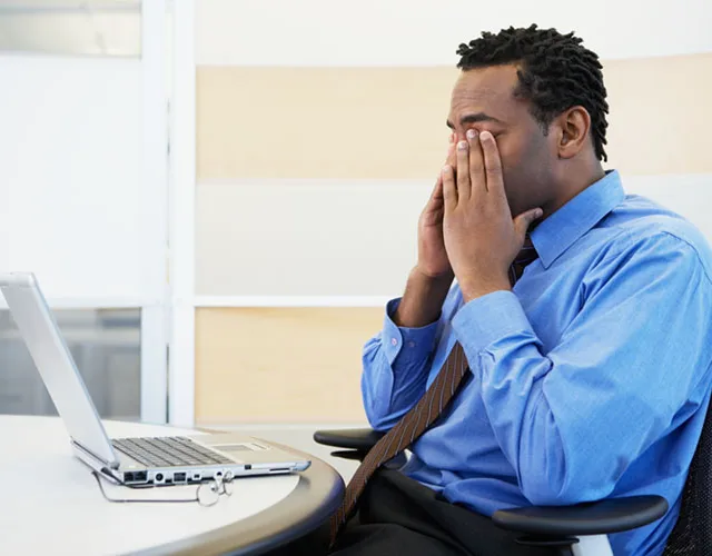 Tired looking office worker