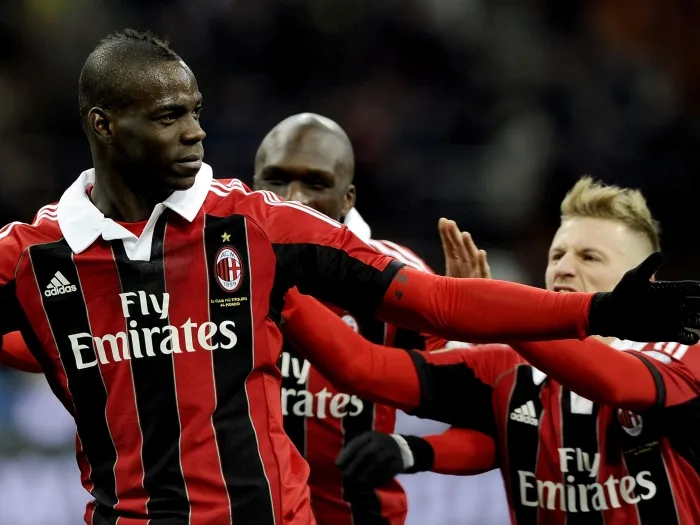 MILAN, ITALY – FEBRUARY 03: Mario Balotelli of AC Milan celebrates scoring the second goal during the Serie A match between AC Milan and Udinese Calcio at San Siro Stadium on February 3, 2013 in Milan, Italy. (Photo by Claudio Villa/Getty Images) Generated by IJG JPEG Library