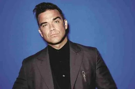 Robbie Williams diz que quer tocar no Rock in Rio e confirma vício em sexo