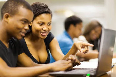 african college students using laptop