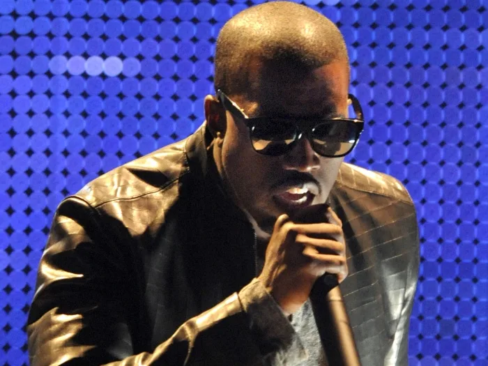 Kanye West performs for the Kanye West Foundation at the Chicago Theatre in Chicago, Thursday, June, 11, 2009. (AP Photo/Paul Beaty)