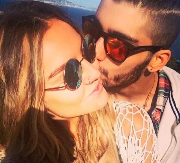 Após suposta traição, Zayn Malik beija noiva em foto