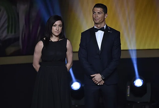 Real Madrid and Portugal forward Cristiano Ronaldo (R) and Wolfsburg’s German midfielder Nadine Kessler (L) stand on stage during the 2014 FIFA Ballon d’Or award ceremony at the Kongresshaus in Zurich on January 12, 2015. AFP PHOTO / FABRICE COFFRINI