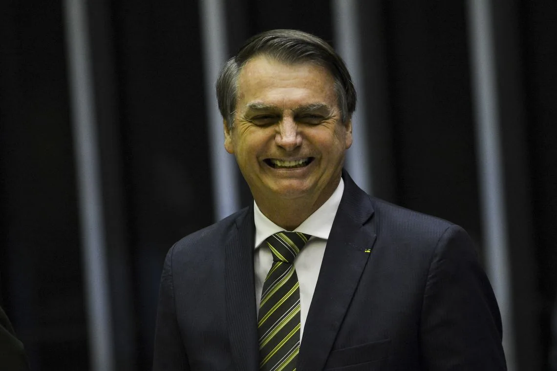 O presidente Jair Bolsonaro participa de sessão solene em homenagem ao aniversário do Comando de Operações Especiais do Exército Brasileiro, na Câmara dos Deputados.