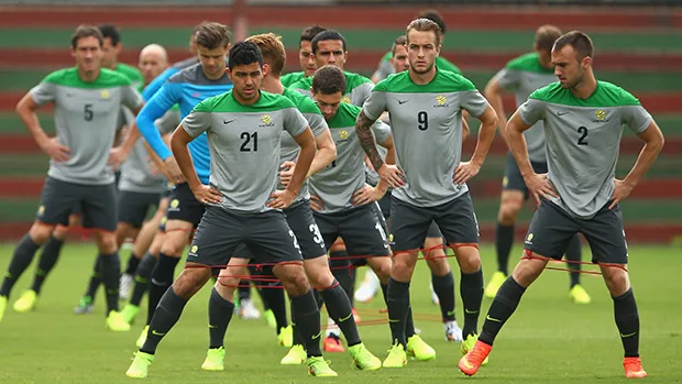 VITORIA, BRAZIL – JUNE 04: Socceroo players stretch during an Australian Socceroos training session at Arena Unimed Sicoob on June 4, 2014 in Vitoria, Brazil. (Photo by Cameron Spencer/Getty Images)