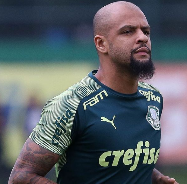 Felipe Melo treina com bola e chuteiras no Palmeiras e acelera recuperação