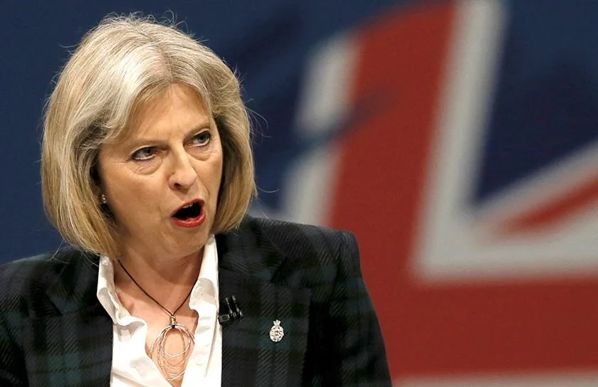 Britain’s Home Secretary Theresa May delivers her keynote address on the second day of the Conservative party annual conference in Manchester, northern England September 30, 2013. REUTERS/Phil Noble (BRITAIN – Tags: POLITICS SOCIETY) – RTR3FFSM