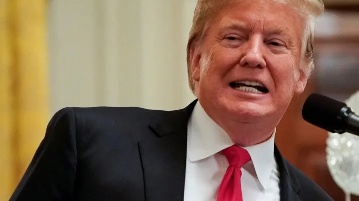 U.S. President Donald Trump welcomes the 2018 College Football Playoff National Champion Clemson Tigers in the East Room of the White House in Washington, U.S., January 14, 2019. REUTERS/Joshua Roberts – RC139503AE10