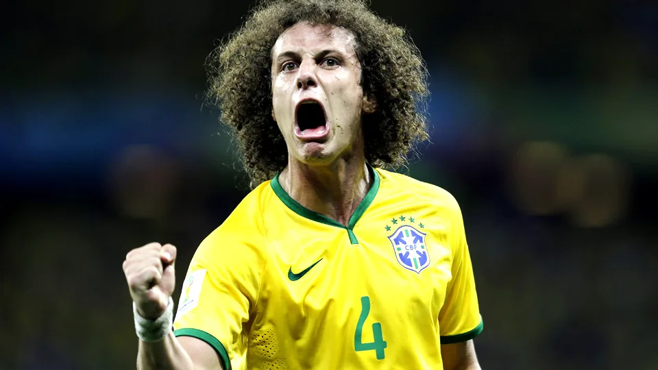 Brazil’s David Luiz celebrates after scoring his side’s second goal on a free kick during the World Cup quarterfinal soccer match between Brazil and Colombia at the Arena Castelao in Fortaleza, Brazil, Friday, July 4, 2014. (AP Photo/Natacha Pisarenko)