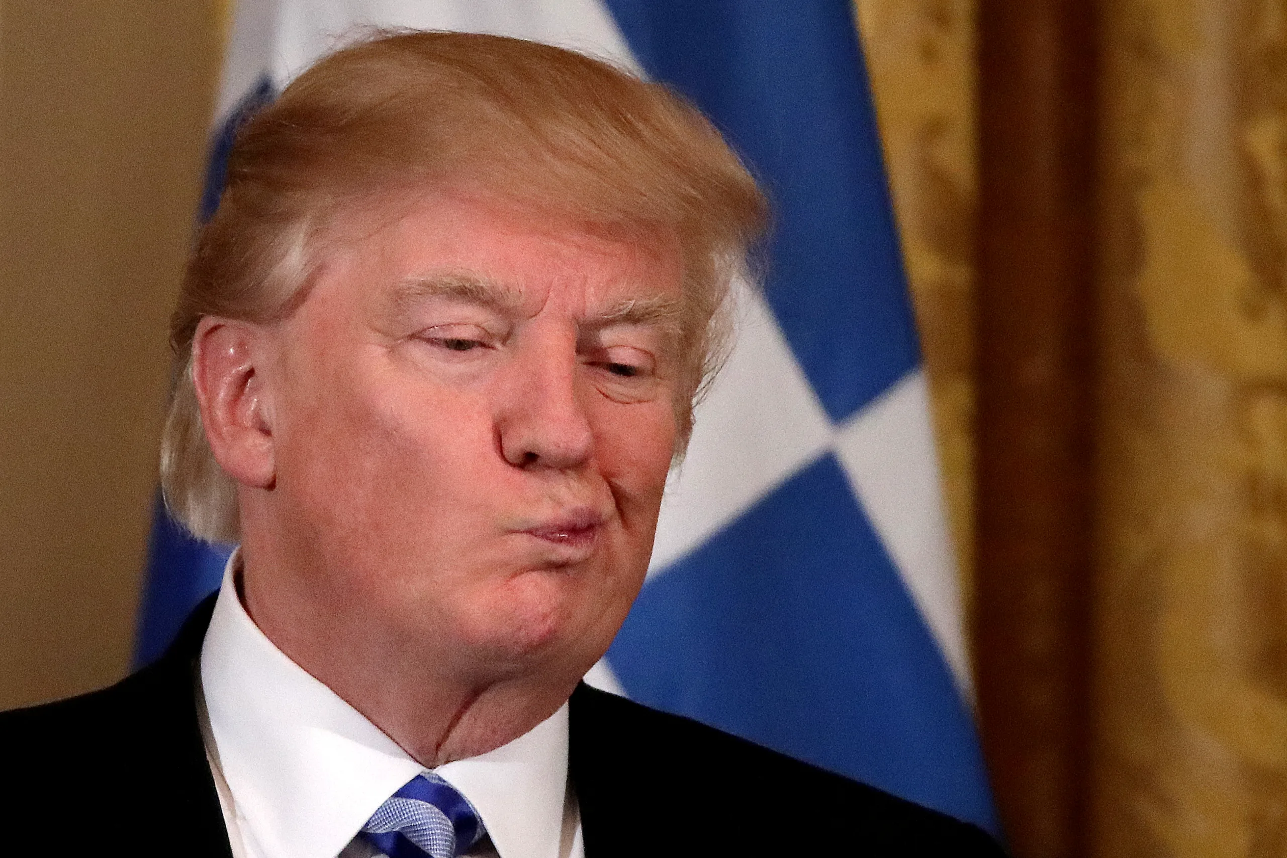 U.S. President Donald Trump reacts as he hosts a Greek Independence Day celebration at the East room of the White House in Washington, U.S. March 24, 2017. REUTERS/Carlos Barria TPX IMAGES OF THE DAY – RTX32LJ2