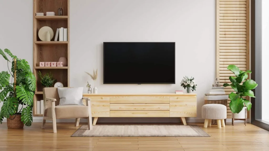 TV cabinet on the white wall in living room with armchair,minimal design,3d rendering