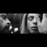 Como travesti, Cauã Reymond surge irreconhecível em clipe de Bárbara Ohana