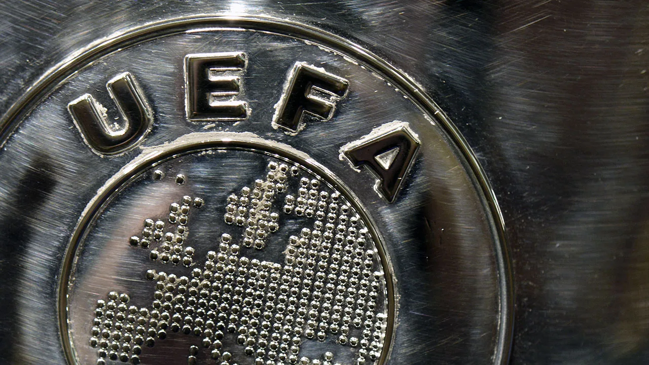 NYON, SWITZERLAND – JULY 18: The UEFA logo is seen on the UEFA Champions League trophy as it is prepared for the UEFA 2014/15 Champions League third qualifying rounds draw at the UEFA headquarters, The House of European Football, on July 18, 2014 in Nyon, Switzerland. (Photo by Harold Cunningham/Getty Images for UEFA)