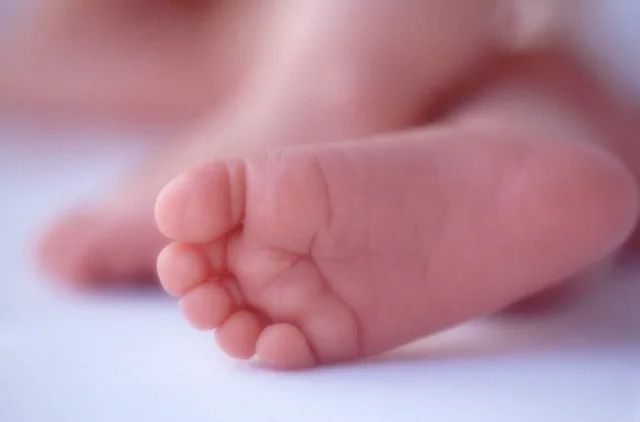 Sleeping baby feet — Image by © Dann Tardif/LWA/Corbis