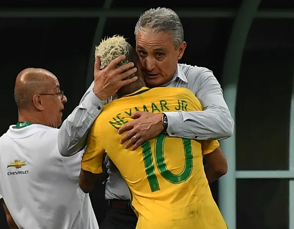 Brazil’s Neymar Jr celebrates with coach Tite, after scoring against Colombia during their Russia 2018 FIFA World Cup football qualifier match Brazil vs Colombia, in Manaus, Brazil, on September 6, 2016. / AFP / VANDERLEI ALMEIDA (Photo credit should read VANDERLEI ALMEIDA/AFP/Getty Images)