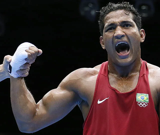 Yamaguchi Falcao Florentino of Brazil is declared winner over Fanlong Meng of China in their round of 16 Light-heavyweight (81kg) match of the London 2012 Olympic Games at the ExCel Arena on August 4, 2012 in London. Florentino was awarded a close points decision victory. AFP PHOTO / Jack GUEZ