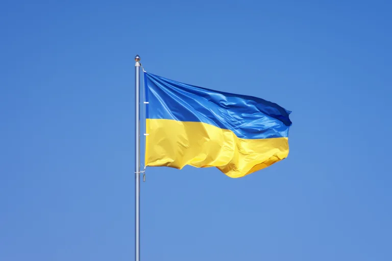 Ukrainian flag on blue sky backgroud