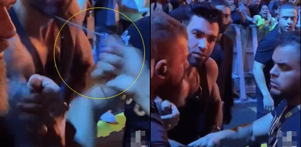 Que susto! Gusttavo Lima tem colar furtado por fã durante show