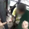Vídeo mostra resgate de aluno com cabeça presa em portão de escola em Vitória