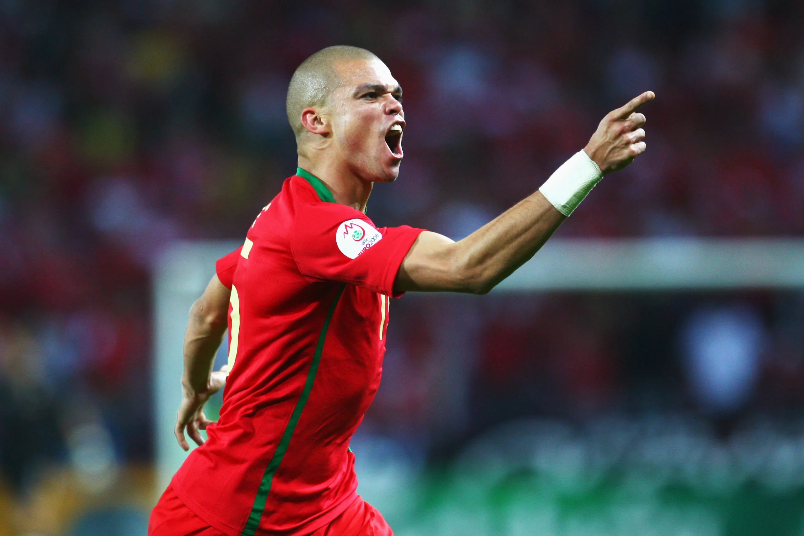 UEFA Euro 2008 7/6/2008 Portugal Pepe celebrates after scoring the opening goal Mandatory Credit ©INPHO/Getty Images