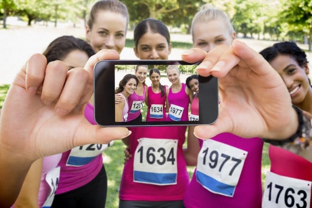 08 Apr 2013 — Composite image of hand holding smartphone showing — Image by © Wavebreak Media Ltd./Corbis