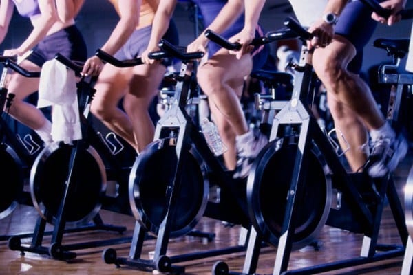 Group of people exercising in a health club