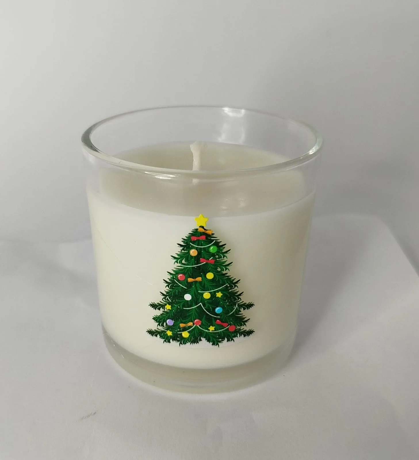 Vela com árvore de Natal