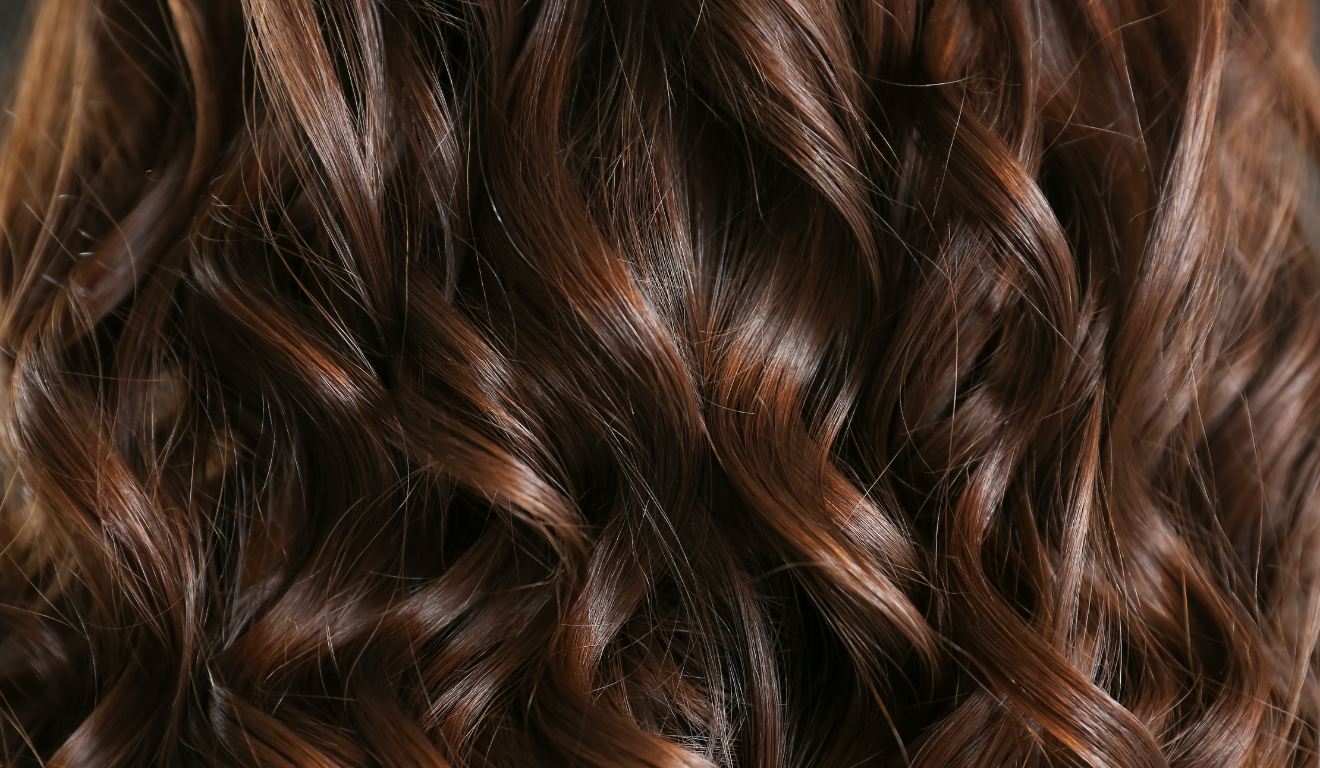 Cabelo ondulado hidratado e bonito/Canva