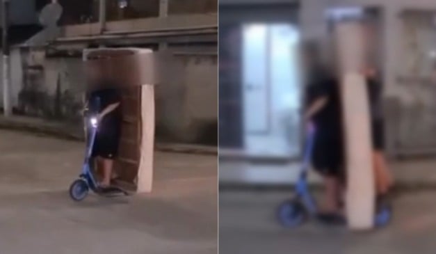 Adolescentes usando patinete elétrico para transportar colchão (Foto/reprodução: TV Vitória)