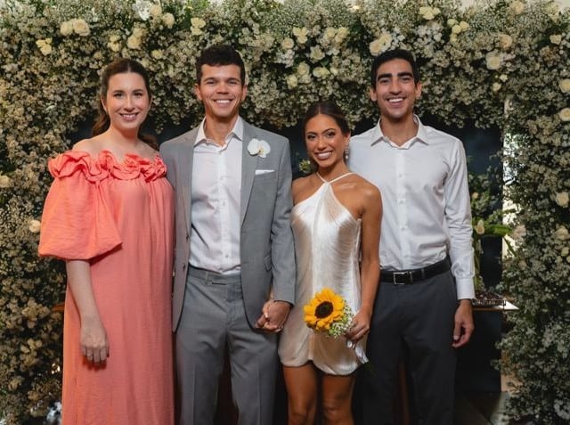 Com os padrinhos Isabel e William Carone