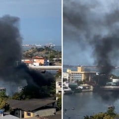 lancha pega fogo no canal de camburi