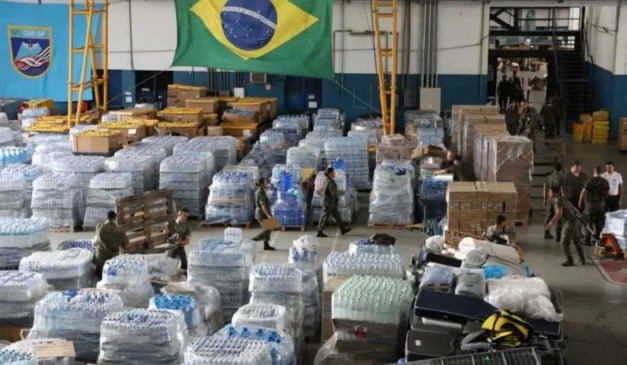 Doações para tragédia climática de 2024 no Rio Grande do Sul armazenadas no hangar da Base Aérea de São Paulo. Foto: Rovena Rosa/Agência Brasil
