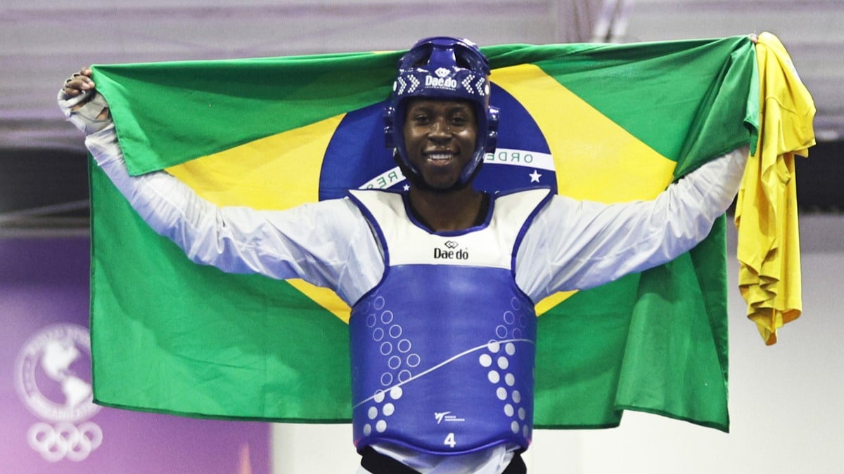 2025.08.16 - Jogos Pan-Americanos Júnior Assunção 2025 - Taekwondo masculino Kyoruhui menos 80kg - O atleta Henrique Marques do Time Brasil vence o atleta da Colombia e conquista a medalha de ouro. Foto: Ana Patricia/COB.