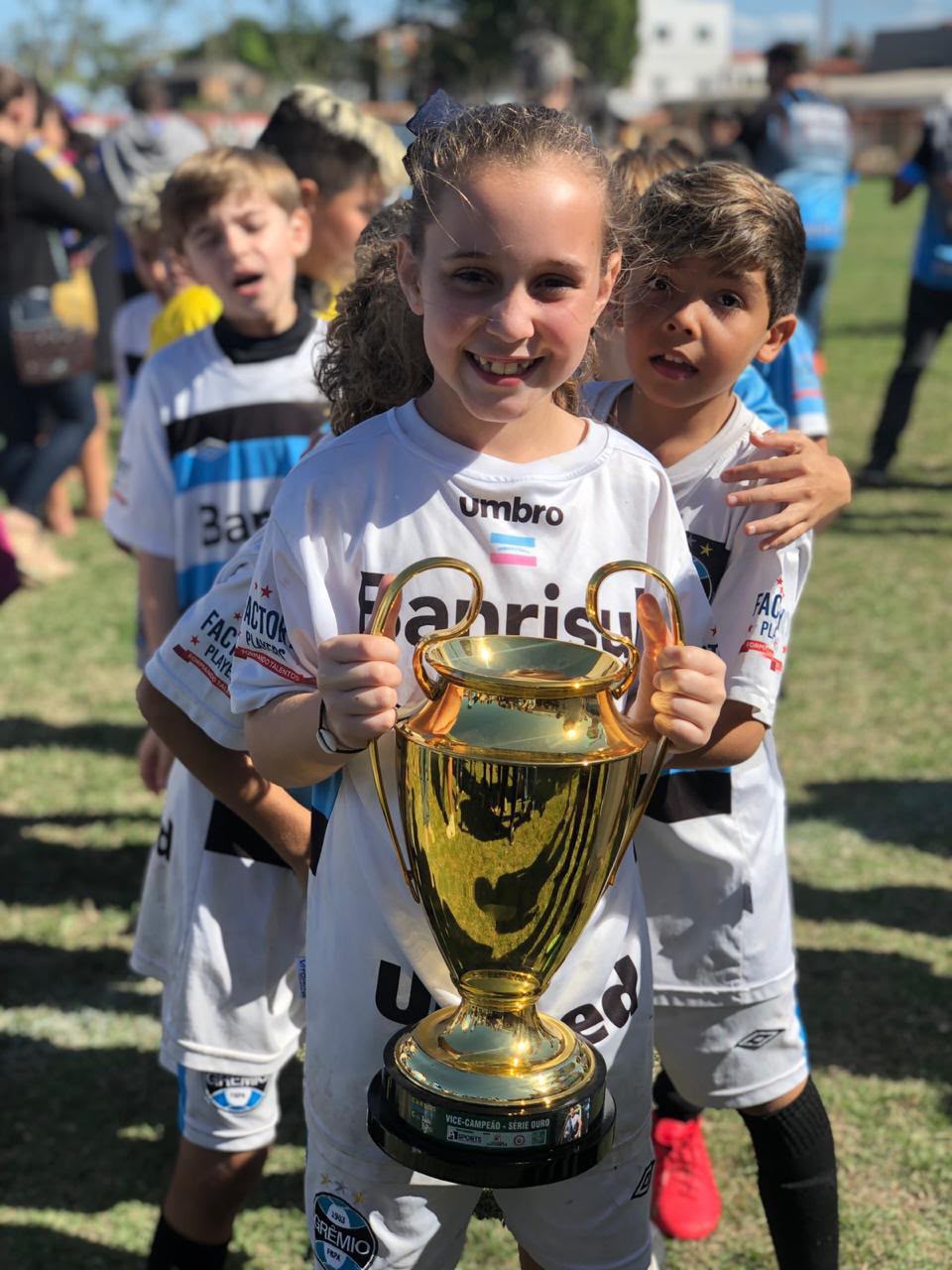 Liz celebrando um dos seus primeiros títulos na carreira.