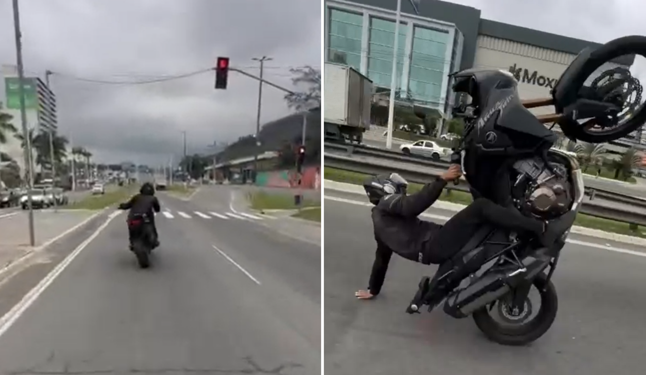 Motociclista encosta a mão no asfalto ao empinar moto em avenida de Cariacica - QTU Questões do Universo